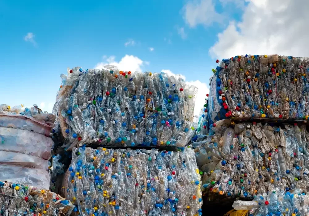 Plastic bottles baled and tied for industrial-scale waste removal.